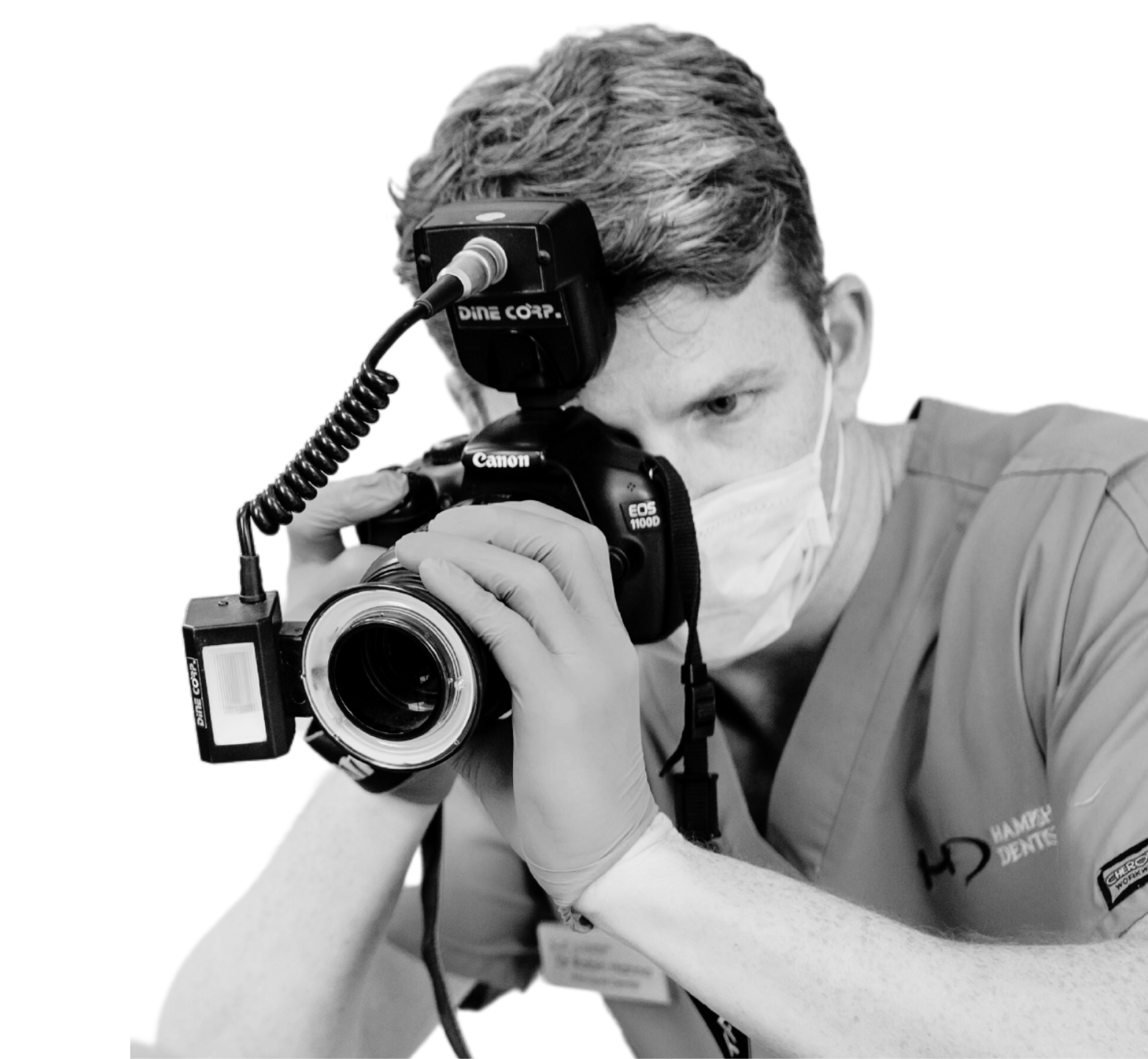 Dental Veneers - Hampshire Dentists Pain Free Dentist in Southampton Dr Robin Hanna holding camera, taking clinical photos to enable designing new smile.