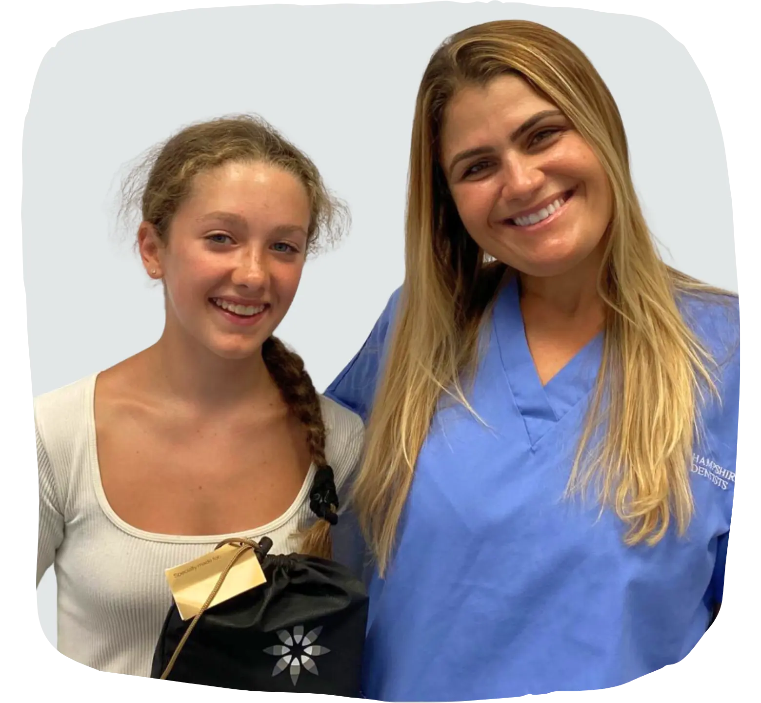 Dr-Joanna-Binato-with-with-Invisalign-patient home