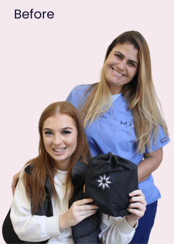 Invisalign - Hampshire Dentists Pain Free Dentist in Southampton Dr Joanna Binato with patient receiving their first Invisalign aligners, celebrating the start of their teeth straightening