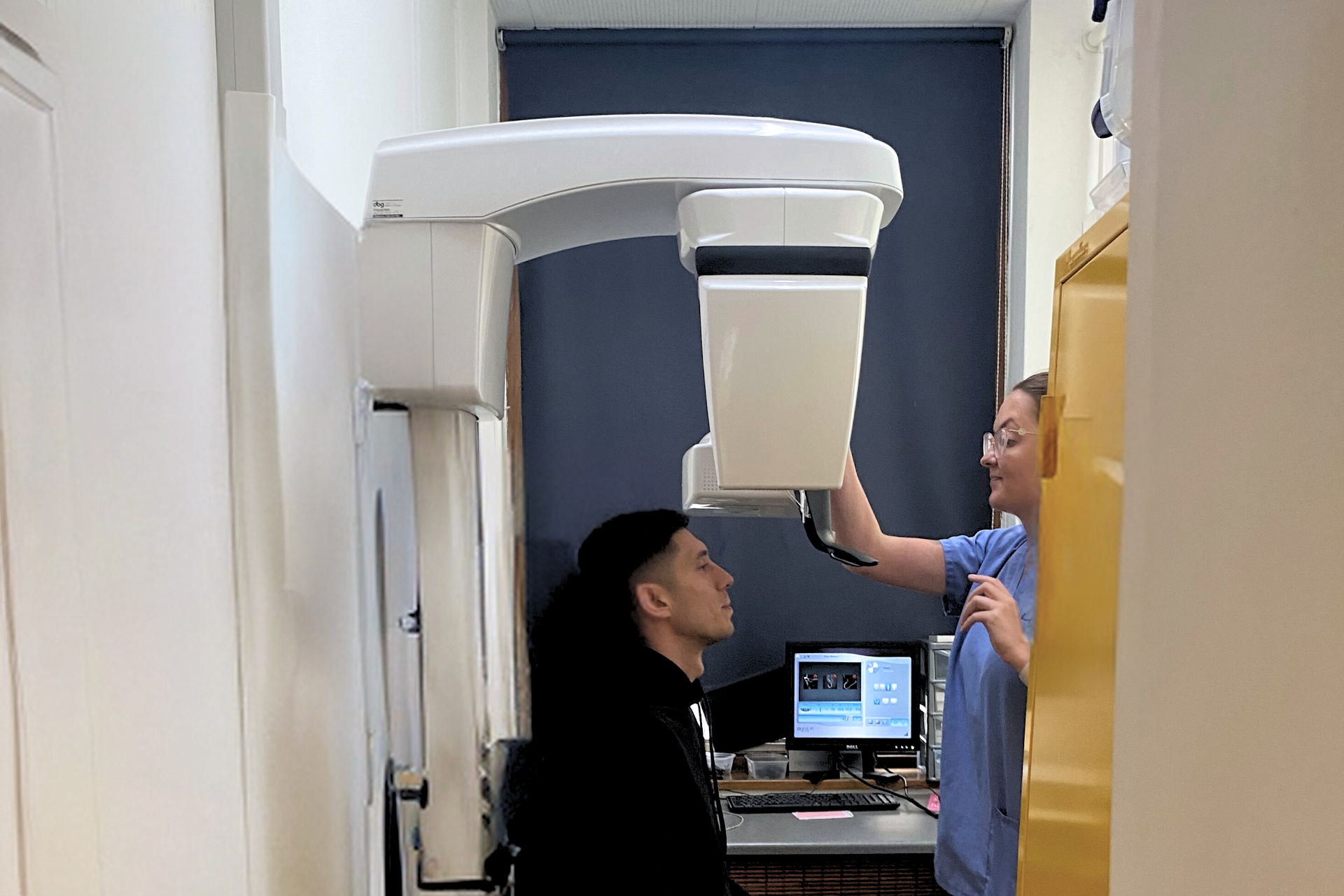 Referrals - Hampshire Dentists Pain Free Dentist in Southampton Patient undergoing OPG X-ray to aid with treatment planning